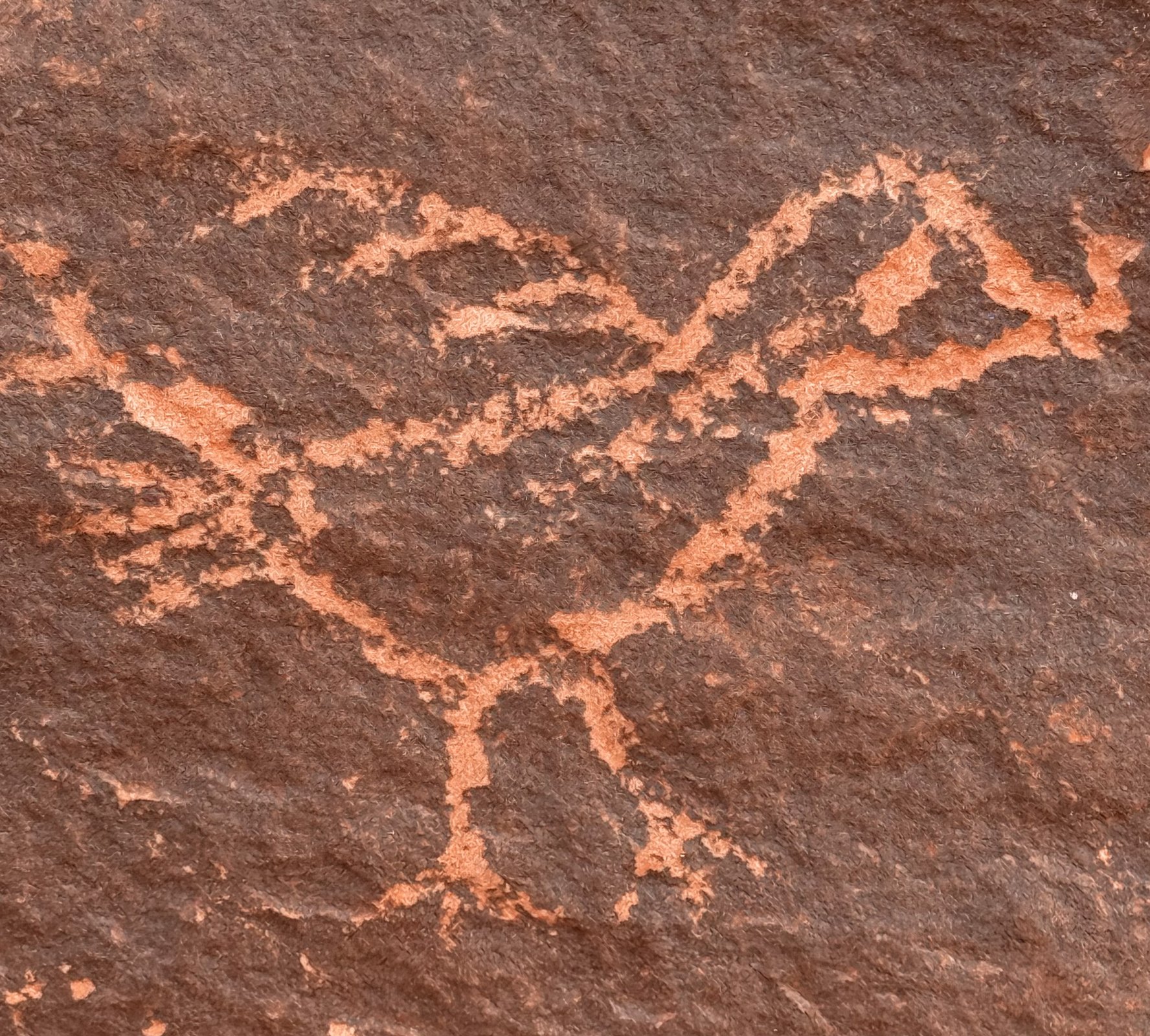 Rock art figure on red sandstone